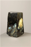 Labradorite. This mineral reflects light inside itself in a special way, which gives it a glow. It is mainly found in Canadian volcanic rock formations such as basalt.
